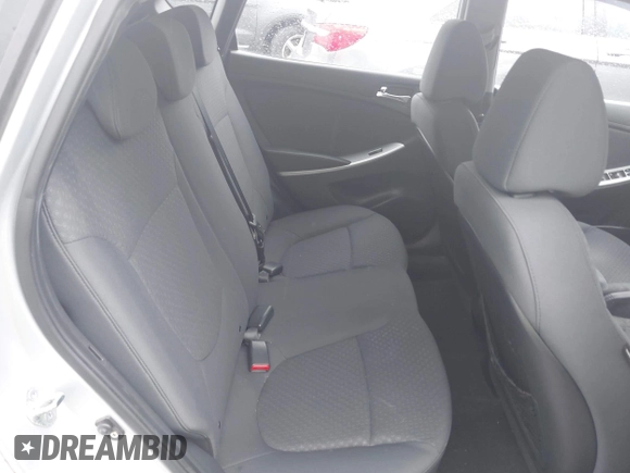 2012 Hyundai Accent SE z VIN KMHCU5AE0CU054285, wystawiony jako IAAI lot #42170678 z przebiegiem 92 172 mil mil oraz . Historia ofert i sprzedaży dostępna na DreamBid. Obrazek 8.