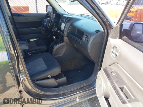 2014 Jeep Patriot Latitude with VIN 1C4NJPFB5ED624378, listed as a IAAI auction lot 42195410 with 234,059 mi miles and . Bid and sale history available at carsss.com. Image 5.