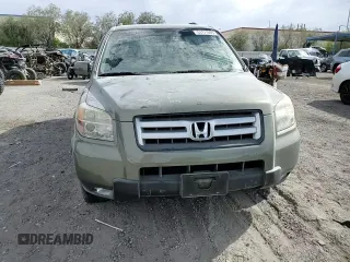 2007 Honda Pilot EX-L z VIN 2HKYF18537H521962, wystawiony jako Copart lot #53171095 z przebiegiem 79 686 mil mil oraz Szkoda całkowita • Salvage title. Historia ofert i sprzedaży dostępna na DreamBid. Obrazek 12.