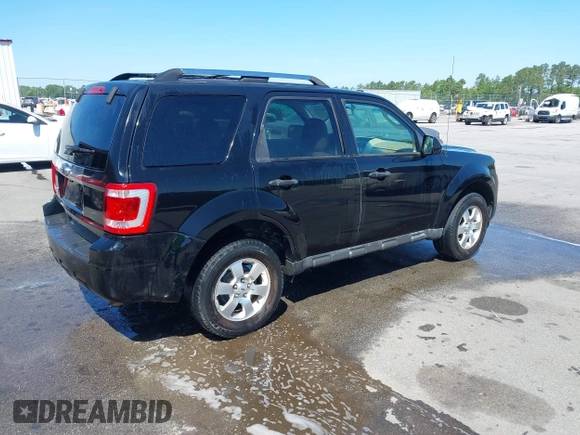 2012 Ford Escape Limited with VIN 1FMCU0E76CKC10758, listed as a IAAI auction lot 42116295 with 219,364 mi miles. Bid and sale history available at carsss.com. Image 4.