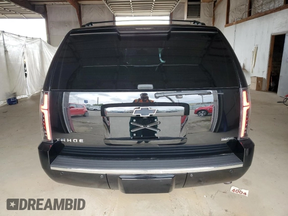 2010 Chevrolet Tahoe LTZ with VIN 1GNUKCE05AR236038, listed as a Copart auction lot 63033425 with 132,236 mi miles and Salvage title. Bid and sale history available at DreamBid. Image 6.