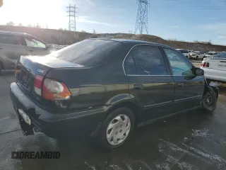 1997 Honda Civic EX z VIN 1HGEJ8646VL033197, wystawiony jako Copart lot #84891944 z przebiegiem Nie podano mil oraz Szkoda całkowita • Salvage title. Historia ofert i sprzedaży dostępna na DreamBid. Obrazek 3.