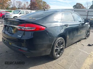 2018 Ford Fusion SE with VIN 3FA6P0HDXJR157605, listed as a IAAI auction lot 40979897 with 128,322 mi miles. Bid and sale history available at carsss.com. Image 4.