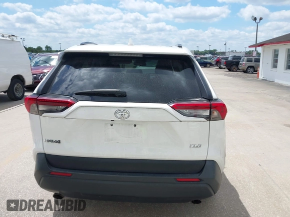 2019 Toyota RAV4 XLE with VIN 2T3W1RFVXKW033696, listed as a IAAI auction lot 42044151 with 126,872 mi miles and . Bid and sale history available at DreamBid. Image 17.