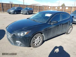 2015 Mazda Mazda3 i Touring with VIN 3MZBM1V74FM180966, listed as a IAAI auction lot 41466609 with 165,231 mi miles. Bid and sale history available at carsss.com. Image 17.
