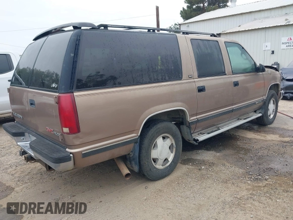 1995 GMC Suburban z VIN 1GKFK16K5SJ723038, wystawiony jako IAAI lot #41904397 z przebiegiem 142 082 mil mil oraz . Historia ofert i sprzedaży dostępna na DreamBid. Obrazek 4.