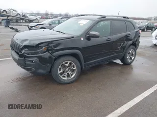 2019 Jeep Cherokee Trailhawk Elite with VIN 1C4PJMBX6KD418409, listed as a IAAI auction lot 41178690 with 80,755 mi miles. Bid and sale history available at carsss.com. Image 2.