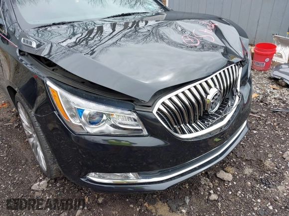 2014 Buick LaCrosse Premium II with VIN 1G4GF5G39EF172201, listed as a IAAI auction lot 41963281 with 106,231 mi miles and . Bid and sale history available at DreamBid. Image 6.