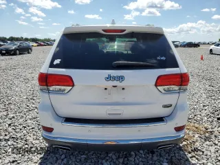 2018 Jeep Grand Cherokee Summit с VIN 1C4RJEJG7JC228316, выставлен на аукционе Copart как лот 57062435 с пробегом 99 442 миль миль и Списание • Salvage title. История ставок и продаж доступна на DreamBid. Изображение 6.