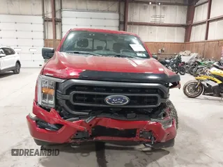 2021 Ford F-150 XL with VIN 1FTFX1E55MFA44207, listed as a IAAI auction lot 42179647 with 67,900 mi miles and . Bid and sale history available at DreamBid. Image 13.