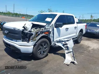 2024 Ford F-150 Lightning XLT с VIN 1FTVW3LK6RWG26665, выставлен на аукционе IAAI как лот 42337628 с пробегом 2 936 миль миль и . История ставок и продаж доступна на DreamBid. Изображение 17.