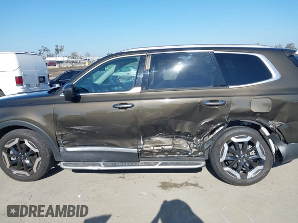 2023 Kia Telluride S with VIN 5XYP6DGC2PG387093, listed as a IAAI auction lot 42299026 with 12,895 mi miles and . Bid and sale history available at DreamBid. Image 14.
