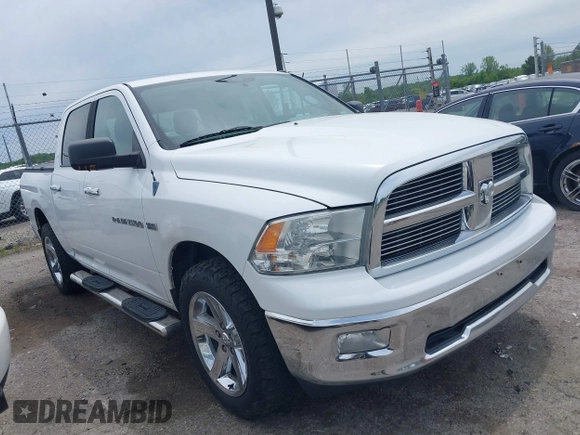 2012 Ram 1500 Outdoorsman z VIN 1C6RD7LT6CS122906, wystawiony jako IAAI lot #42359190 z przebiegiem 170 183 mil mil oraz . Historia ofert i sprzedaży dostępna na DreamBid. Obrazek 1.