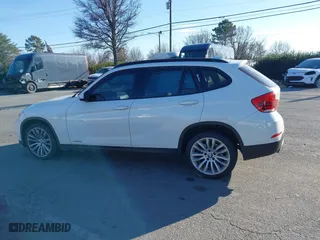 2015 BMW X1 xDrive28i with VIN WBAVL1C50FVY26009, listed as a IAAI auction lot 41495667 with 109,807 mi miles. Bid and sale history available at carsss.com. Image 14.