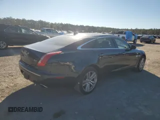 2013 Jaguar XJ with VIN SAJWA2G16DLV50973, listed as a Copart auction lot 82555074 with 148,956 mi miles and Salvage Title. Bid and sale history available at carsss.com. Image 3.