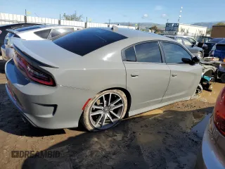 2023 Dodge Charger GT with VIN 2C3CDXHG0PH670993, listed as a Copart auction lot 48915405 with 7,740 mi miles and Salvage Title. Bid and sale history available at DreamBid. Image 3.