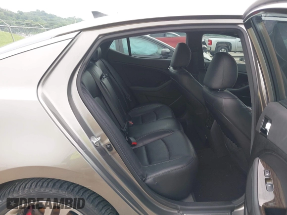 2013 Kia Optima SX with VIN 5XXGR4A62DG105805, listed as a IAAI auction lot 42492169 with 134,908 mi miles and . Bid and sale history available at DreamBid. Image 8.