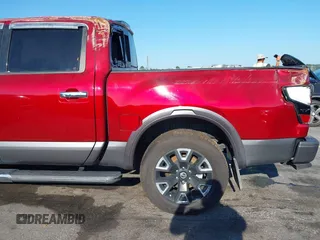 2021 Nissan Titan Pro-4X with VIN 1N6AA1ED4MN525555, listed as a IAAI auction lot 42563247 with 63,259 mi miles and . Bid and sale history available at DreamBid. Image 16.