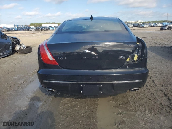 2016 Jaguar XJ with VIN SAJWJ2GDXG8W03143, listed as a Copart auction lot 86467114 with NaN miles and Salvage Title. Bid and sale history available at carsss.com. Image 6.