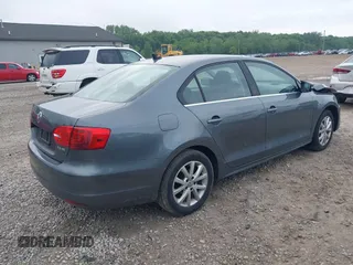 2013 Volkswagen Jetta SE with VIN 3VWDX7AJ7DM426720, listed as a IAAI auction lot 42366632 with 142,318 mi miles and . Bid and sale history available at DreamBid. Image 4.