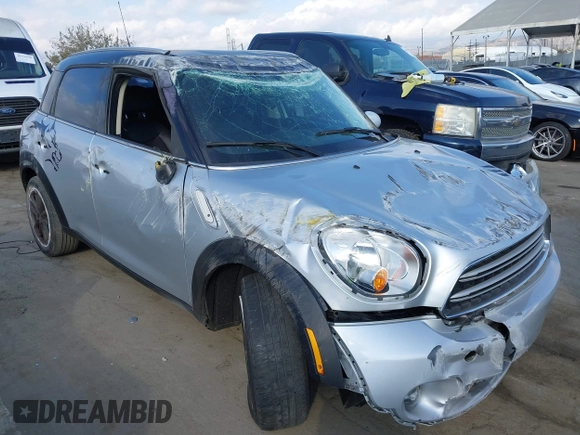 2015 MINI Countryman with VIN WMWZB3C56FWR43359, listed as a IAAI auction lot 40720320 with 69,898 mi miles and . Bid and sale history available at DreamBid. Image 1.