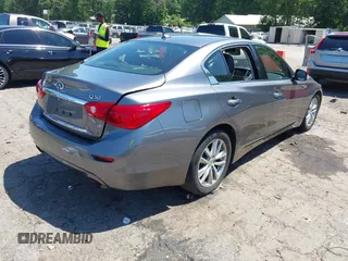 2015 Infiniti Q50 with VIN JN1BV7AP0FM357018, listed as a IAAI auction lot 42326677 with 179,436 mi miles and . Bid and sale history available at DreamBid. Image 4.