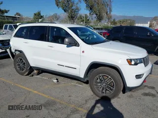 2017 Jeep Grand Cherokee Trailhawk with VIN 1C4RJFLGXHC959092, listed as a IAAI auction lot 41232281 with 108,659 mi miles and . Bid and sale history available at DreamBid. Image 1.