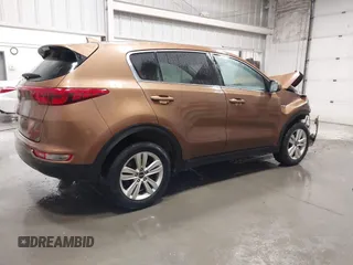 2018 Kia Sportage LX with VIN KNDPMCAC9J7403108, listed as a IAAI auction lot 41946497 with 123,023 mi miles. Bid and sale history available at carsss.com. Image 4.