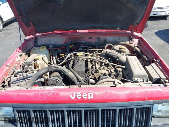 1996 Jeep Cherokee Sport with VIN 1J4FT68S0TL225719, listed as a IAAI auction lot 42121351 with 237,602 mi miles and . Bid and sale history available at DreamBid. Image 10.