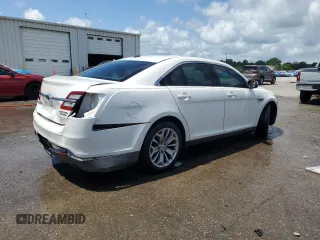 2014 Ford Taurus Limited с VIN 1FAHP2F89EG120939, выставлен на аукционе Copart как лот 59204815 с пробегом 180 105 миль миль и Списание • Salvage title. История ставок и продаж доступна на DreamBid. Изображение 3.