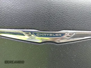 2014 Chrysler 200 Touring with VIN 1C3CCBBBXEN118019, listed as a IAAI auction lot 42154127 with 140,301 mi miles and . Bid and sale history available at carsss.com. Image 12.