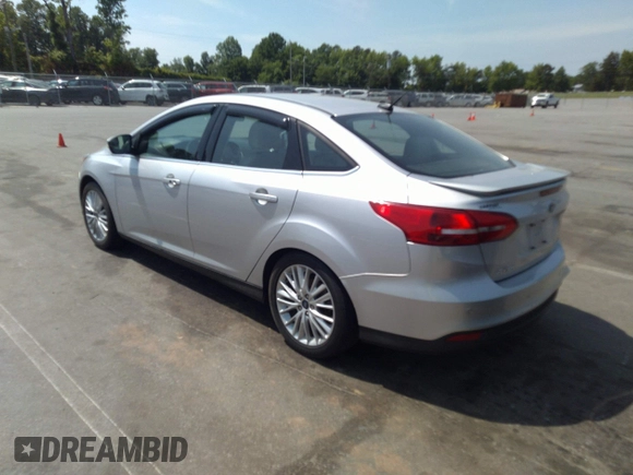 2018 Ford Focus Titanium with VIN 1FADP3J26JL280723, listed as a IAAI auction lot 42319900 with 149,583 mi miles and . Bid and sale history available at DreamBid. Image 3.