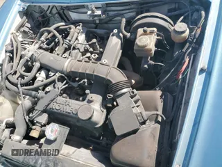 1989 Alfa Romeo Spider z VIN ZARBA5587K1066209, wystawiony jako Copart lot #77166704 z przebiegiem 98 255 mil mil oraz Szkoda całkowita • Salvage title. Historia ofert i sprzedaży dostępna na DreamBid. Obrazek 7.