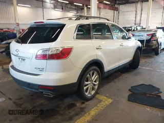 2012 Mazda CX-9 Grand Touring with VIN JM3TB3DV8C0359977, listed as a IAAI auction lot 41142648 with 115,979 mi miles. Bid and sale history available at carsss.com. Image 4.