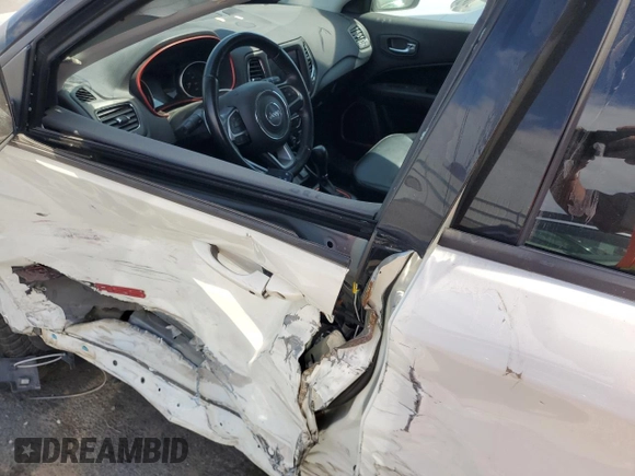 2019 Jeep Compass Trailhawk with VIN 3C4NJDDB4KT790351, listed as a Copart auction lot 48588285 with 67,417 mi miles and Salvage Title. Bid and sale history available at DreamBid. Image 7.