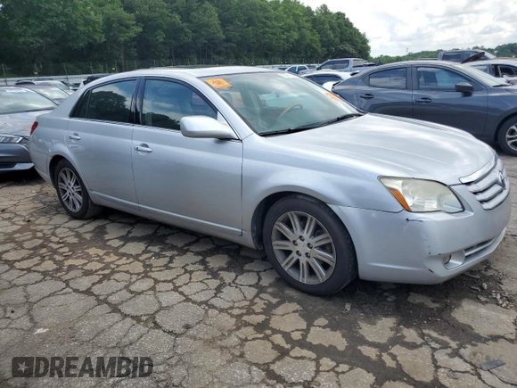 2007 Toyota Avalon XL z VIN 4T1BK36B47U186914, wystawiony jako Copart lot #60364125 z przebiegiem 239 293 mil mil oraz Czysty tytuł • Clean title. Historia ofert i sprzedaży dostępna na DreamBid. Obrazek 4.