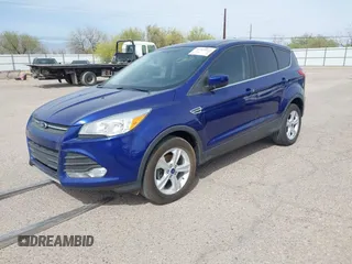 2015 Ford Escape SE with VIN 1FMCU0GX1FUB81563, listed as a IAAI auction lot 41564612 with 120,582 mi miles and . Bid and sale history available at DreamBid. Image 2.