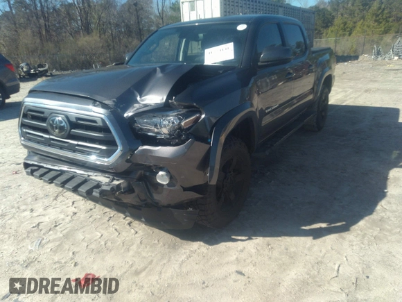 2018 Toyota Tacoma SR5 with VIN 5TFAZ5CN0JX056706, listed as a IAAI auction lot 41774141 with 31,738 mi miles and . Bid and sale history available at DreamBid. Image 6.