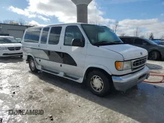 2002 Ford Econoline Cargo with VIN 1FDRE14WX2HB48802, listed as a Copart auction lot 44194335 with 140,559 mi miles and Clean Title. Bid and sale history available at DreamBid. Image 4.
