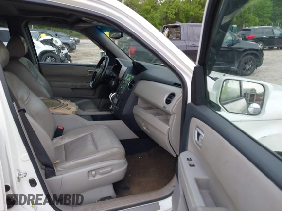 2011 Honda Pilot Touring z VIN 5FNYF4H9XBB053966, wystawiony jako IAAI lot #42148528 z przebiegiem 191 939 mil mil oraz . Historia ofert i sprzedaży dostępna na DreamBid. Obrazek 5.