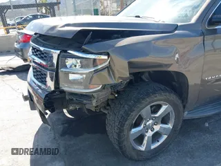 2016 Chevrolet Tahoe LS with VIN 1GNSCAKC7GR419294, listed as a IAAI auction lot 42020006 with 83,945 mi miles and . Bid and sale history available at DreamBid. Image 6.