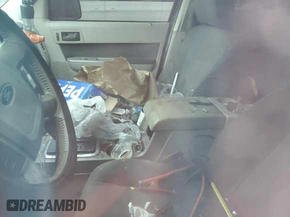 2009 Ford Escape Hybrid with VIN 1FMCU493X9KC01844, listed as a Copart auction lot 58220035 with Not provided miles and Salvage title. Bid and sale history available at DreamBid. Image 8.