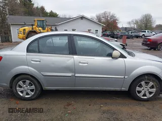 2010 Kia Rio LX with VIN KNADH4A37A6645279, listed as a IAAI auction lot 40856780 with 165,385 mi miles. Bid and sale history available at carsss.com. Image 13.