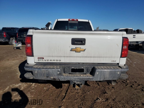 2019 Chevrolet Silverado 3500HD LTZ z VIN 1GC4KXCY0KF276409, wystawiony jako Copart lot #88408515 z przebiegiem 125 787 mil mil oraz Szkody całkowita. Historia ofert i sprzedaży dostępna na DreamBid. Obrazek 6.