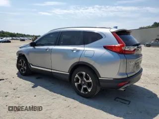 2018 Honda CR-V Touring with VIN 7FARW1H9XJE001467, listed as a Copart auction lot 55222005 with 65,611 mi miles and Salvage title. Bid and sale history available at DreamBid. Image 2.