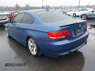 2007 BMW 3 Series 335i with VIN WBAWB73597P037969, listed as a IAAI auction lot 41602590 with 117,238 mi miles and . Bid and sale history available at DreamBid. Image 3.