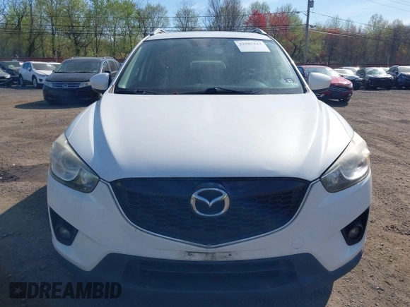 2013 Mazda CX-5 Grand Touring with VIN JM3KE4DE3D0156957, listed as a IAAI auction lot 42085443 with 146,990 mi miles. Bid and sale history available at carsss.com. Image 12.