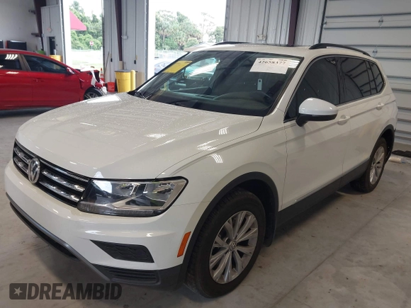 2018 Volkswagen Tiguan SEL z VIN 3VV3B7AX1JM167656, wystawiony jako IAAI lot #42658377 z przebiegiem 74 130 mil mil oraz . Historia ofert i sprzedaży dostępna na DreamBid. Obrazek 17.