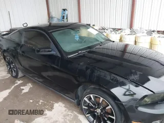 2012 Ford Mustang V6 Premium with VIN 1ZVBP8AM5C5223787, listed as a IAAI auction lot 42141944 with 73,960 mi miles. Bid and sale history available at carsss.com. Image 6.