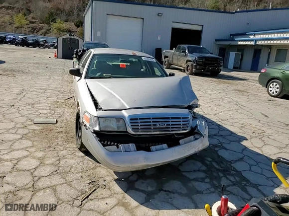 2005 Ford Crown Victoria LX with VIN 2FAFP74W85X121659, listed as a Copart auction lot 44399655 with 145,525 mi miles and Salvage Title. Bid and sale history available at carsss.com. Image 10.